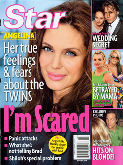 Illustration for article titled This Week In Tabloids: Why Barack Loves Michelle; Angelina Is Anxious Or Adopting